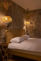 Postel nebo postele na pokoji v ubytování Cappadocia Naif Hotel - Adults Only