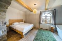 Postel nebo postele na pokoji v ubytování Cappadocia Naif Hotel - Adults Only