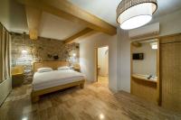 Postel nebo postele na pokoji v ubytování Cappadocia Naif Hotel - Adults Only