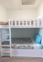 Ein Bett oder Betten in einem Zimmer der Unterkunft Grand Beach Resort Penthouse 1