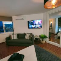 Televízia a/alebo spoločenská miestnosť v ubytovaní Avenida Palma de Mallorca City center with sea views BY NAMASTE ELITE