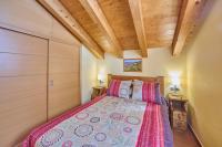 A bed or beds in a room at Aparthotel Areu