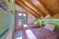 A bed or beds in a room at Aparthotel Areu