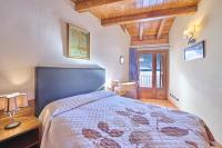 A bed or beds in a room at Aparthotel Areu
