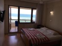 Postel nebo postele na pokoji v ubytování KOÇAN OTEL Hatice Karakoçan