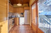 A kitchen or kitchenette at Aparthotel Areu