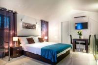 Posteľ alebo postele v izbe v ubytovaní Split Oasis Studio Apartments