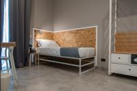 Posteľ alebo postele v izbe v ubytovaní Residence Hotel Moderno