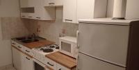 Kuchyň nebo kuchyňský kout v ubytování Apartments Tatjana