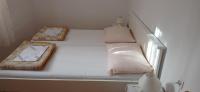 Postel nebo postele na pokoji v ubytování Apartments Tatjana