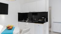 Kuchyň nebo kuchyňský kout v ubytování Apartments Palma Rabac