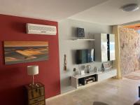 TV a/nebo společenská místnost v ubytování "Casa al Mare" Ferien Apartment mit Wohlfühlgarantie!, Meer,Strand,Golf,Wandern