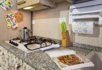 A kitchen or kitchenette at Cervi flat close to the sea and the historic centre of Alghero