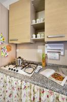 A kitchen or kitchenette at Cervi flat close to the sea and the historic centre of Alghero
