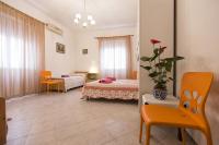 A bed or beds in a room at Cervi flat close to the sea and the historic centre of Alghero