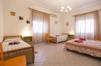 A bed or beds in a room at Cervi flat close to the sea and the historic centre of Alghero