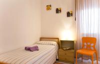 A bed or beds in a room at Cervi flat close to the sea and the historic centre of Alghero