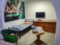 Ein Bett oder Betten in einem Zimmer der Unterkunft הבית הלבן של נתן