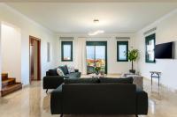 Telewizja i/lub zestaw kina domowego w obiekcie Siena Pool Villa