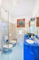Kúpeľňa v ubytovaní Oliveto al Porto Apartments by Wonderful Italy