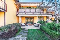 Vonkajšia záhrada v ubytovaní Oliveto al Porto Apartments by Wonderful Italy