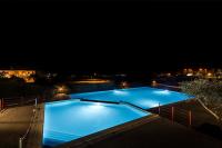 Bazén v ubytovaní Oliveto al Porto Apartments by Wonderful Italy alebo v jeho blízkosti