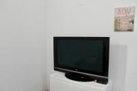 TV a/nebo společenská místnost v ubytování WISH SUITE CONSTANCIA DE SEVILLA