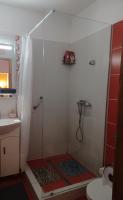 Kúpeľňa v ubytovaní Éva Apartmanház