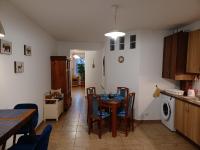 Kuchyňa alebo kuchynka v ubytovaní Éva Apartmanház