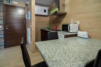 A kitchen or kitchenette at Apartamentos Turísticos Toledo