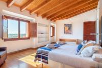 Postel nebo postele na pokoji v ubytování Villa Es Turrió by Mallorca House Rent