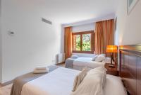 Postel nebo postele na pokoji v ubytování Villa Es Turrió by Mallorca House Rent