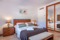 Postel nebo postele na pokoji v ubytování Villa Es Turrió by Mallorca House Rent