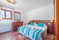 Postel nebo postele na pokoji v ubytování Villa Es Turrió by Mallorca House Rent