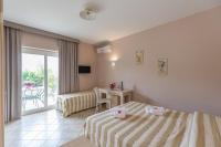 Posteľ alebo postele v izbe v ubytovaní Residenza Borgo Italico