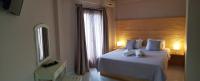 Posteľ alebo postele v izbe v ubytovaní Anemos Hotel