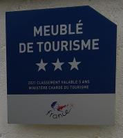 a blue and white sign with the words neille de touinction at Entre ciel et mer, Maison neuve vue mer proche de la plage in Équihen-Plage