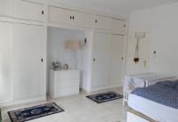 A bed or beds in a room at Villa Salt Lake near city and beach