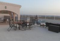 A balcony or terrace at Villa Salt Lake near city and beach