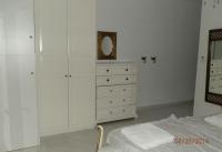 A bed or beds in a room at Villa Salt Lake near city and beach