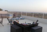 A balcony or terrace at Villa Salt Lake near city and beach