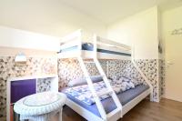 Postel nebo postele na pokoji v ubytování Exklusives Ferienhaus mit Schwimmbad und Sauna