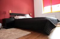 Posteľ alebo postele v izbe v ubytovaní "Rodzinny Apartament pod Śnieżką" na osiedlu "Apartamenty pod Śnieżką"