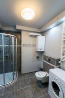 Kúpeľňa v ubytovaní "Rodzinny Apartament pod Śnieżką" na osiedlu "Apartamenty pod Śnieżką"