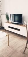 Televízia a/alebo spoločenská miestnosť v ubytovaní Primo Apartments Tramwajowa 17B