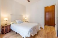 A bed or beds in a room at El Carmen Flat
