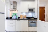 A kitchen or kitchenette at El Carmen Flat