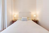 A bed or beds in a room at El Carmen Flat