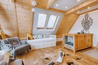 Posteľ alebo postele v izbe v ubytovaní Apartament Tatry Folk regionalny Grota Solna