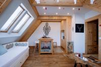 Posteľ alebo postele v izbe v ubytovaní Apartament Tatry Folk regionalny Grota Solna